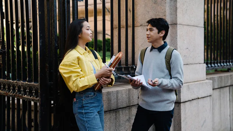 An image of two students talking