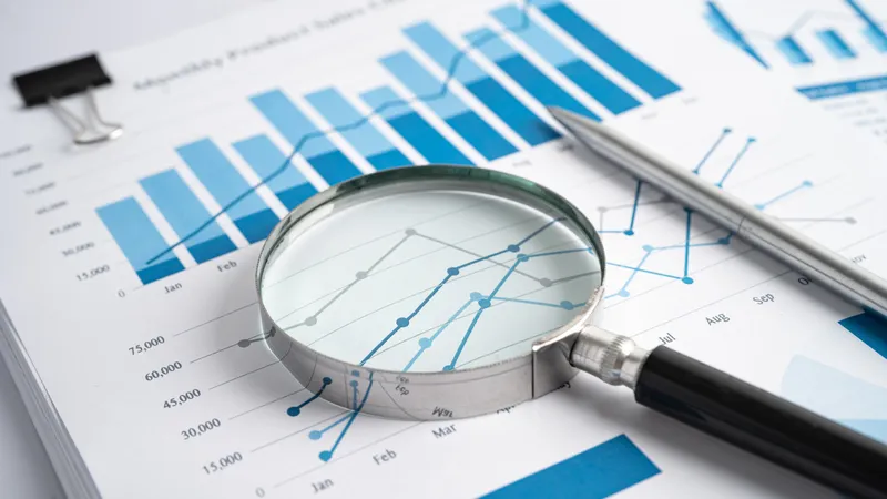 An image of a magnifying lens on a graph paper