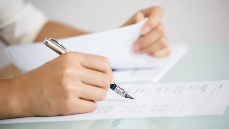 An image of a student making notes