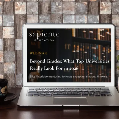 Image of a laptop screen with the Sapiente webinar page